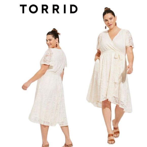 torrid Dresses & Skirts - NWT Mini Lace Wrap Dress size 2